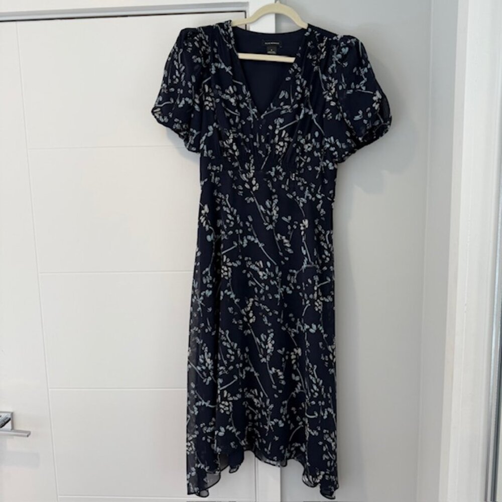Great condition Club Monaco Size 6 Navy floral asymmetric spring dress.
